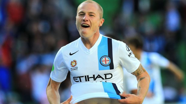 Aaron Mooy celebrates his goal against Perth Glory.