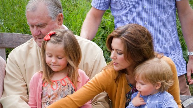 Prince Henrik with Princess Isabella and Crown Princess Mary with Prince Vincent attend at Grasten Palace in  2012.