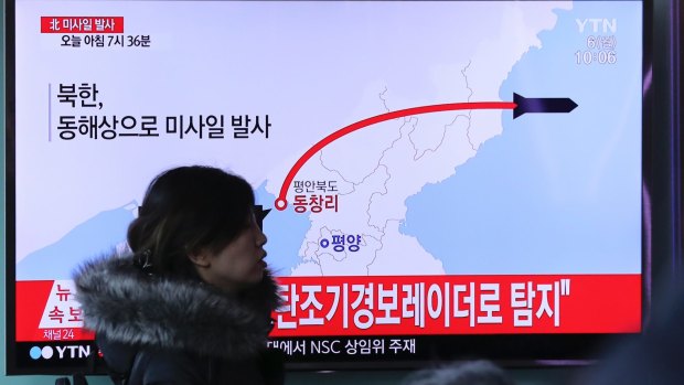 A TV news program reports North Korea's recent missile launch in Seoul, South Korea.