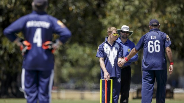 Hamish Makenzie (L), Brendan Spencer (M) and Peter Loh (R) of Victoria, during Victoria vs Queensland, at the 33rd Australian National Blind Cricket Championships, Princes Park, Carlton, Melbourne. 