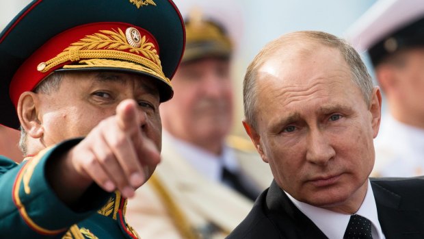Russian Defence Minister Sergei Shoigu and Russian President Vladimir Putin.