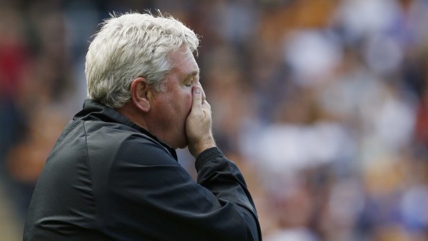 Going down: Steve Bruce watches on as Hull are relegated after a 0-0 draw against Manchester United.