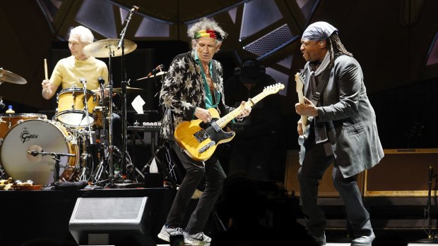 Grand old men: Charlie Watts, left, and Keith Richards of the original Rolling Stones with bass player Darryl Jones in concert at the Rod Laver Arena on November 5.