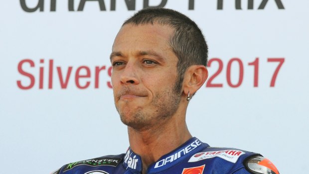 Valentino Rossi's tilt at the MotoGP title is in tatters after a fall at training.