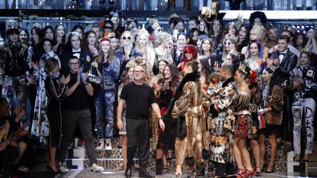 Designers Stefano Gabbana, left, and Domenico Dolce take the catwalk at the end of the presentation of their show. 