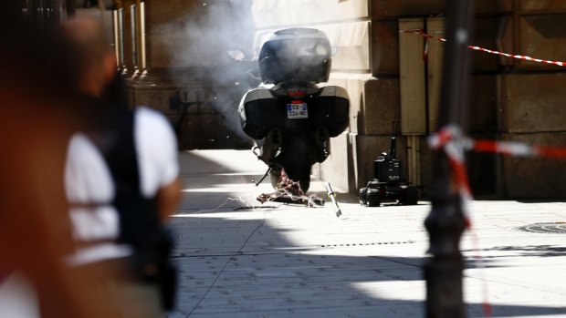 A controlled explosion of a motorcycle in Paris on Friday. Security in the French capital was visibly higher this week as the investigation into the failed railway station attack widened.  