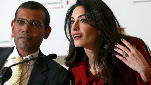 Lawyer Amal Clooney and former Maldivian President Mohamed Nasheed attend a press conference in London on Monday, in his first public comments since leaving jail in the Maldives.
