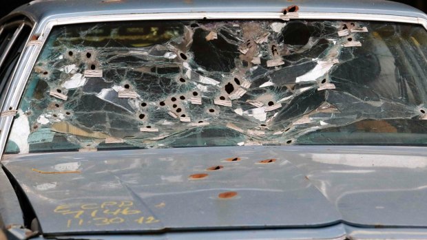 The windshield of Timothy Russell's car is shown as the crime scene was mocked up for the court to review during the manslaughter trial for police officer Michael Brelo in Cleveland, Ohio.