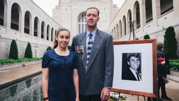 The last post ceremony for Terrance Langlands at the National War Memorial. Langlands family, (nephew and his daughter) David and Amber Langlands.