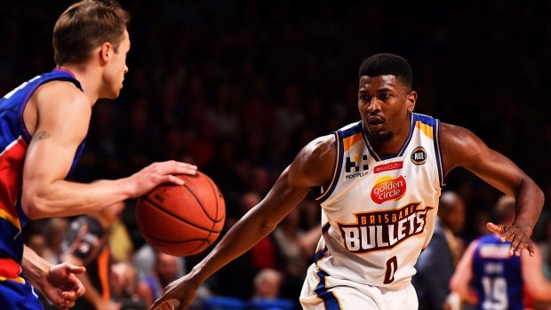 Jermaine Beal of the Brisbane Bullets defends against the Adelaide 36ers.