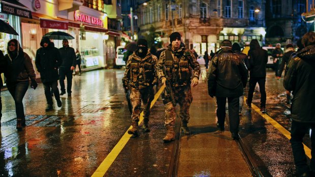 Turkish police patrol in central Istanbul on New Year's Eve. 