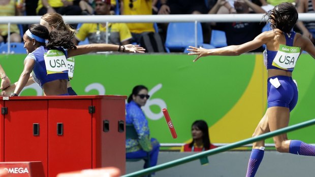 Botched baton drop: English Gardner and Allyson Felix, right, from the United States drop the baton.