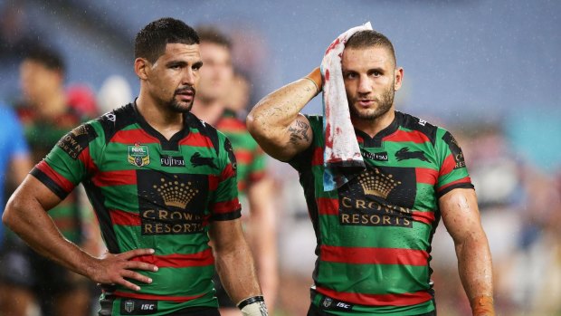 Busted: Robbie Farah (right).