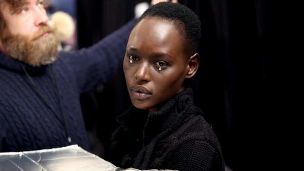 Ajak Deng prepares backstage at the Tome Fall 2016 fashion show during New York Fashion Week: 