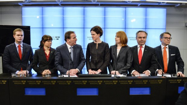 United front: Swedish Prime Minister Stefan Lofven (third from left) is flanked by representatives of the Greens (left) and the centre-right Alliance.