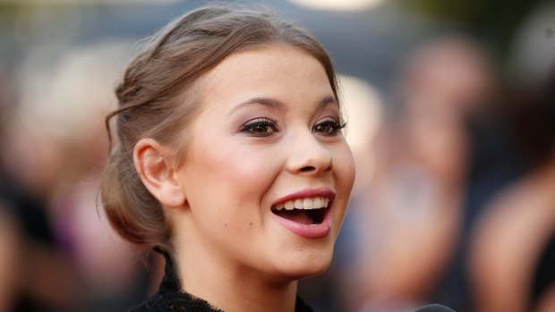 Bindi Irwin, wearing Alex Perry, arrives at the AACTA Awards in Sydney.