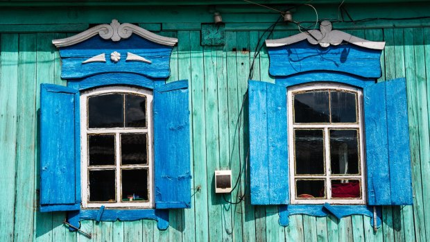 Blue window shutters in Ulan Ude, Siberia, Russia.