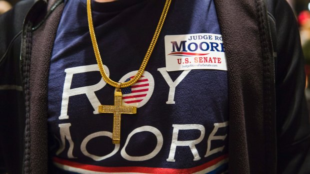A supporter at an election night gathering for Roy Moore.