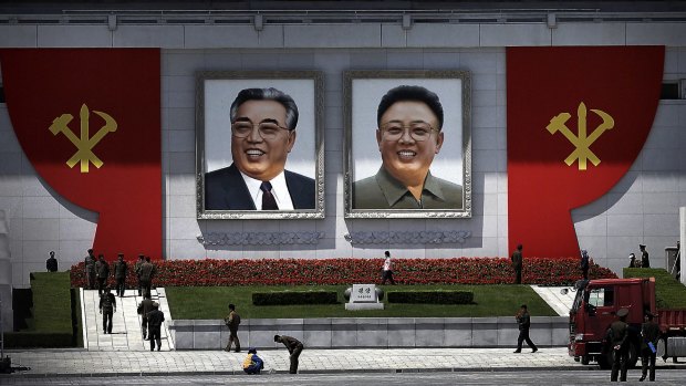 Portraits of the late North Korean leaders Kim Il-sung and Kim Jong-il in North Korea.