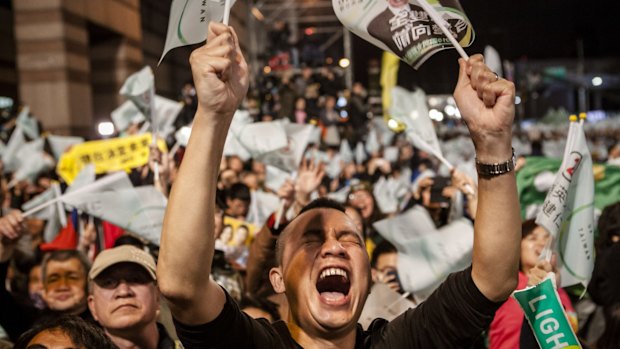 A supporter shouts as attend at DPP headquarters during Tsai Ing-wen's victory speech on January 16 in Taipei, Taiwan. 