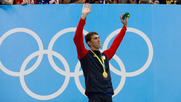 Michael Phelps receives his 22nd Olympic gold medal for the Men's 200m Individual Medley.