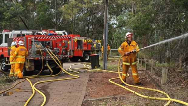 Back with the crew: former prime minister Tony Abbott takes part in an RFS training exercise.