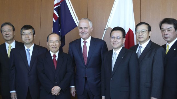 Malcolm Turnbull, centre, discussed topics including whaling in the southern oceans and submarine contract, and broader political, strategic and economic issues in Tokyo in 2015.
