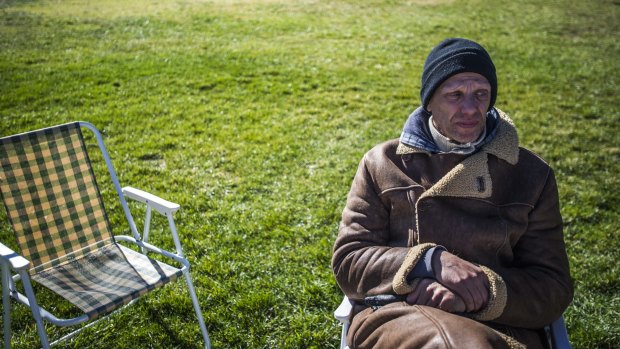 Protester  Alexander Miziner has been sleeping in his car outside Parliament House as the temperature dips to almost minus eight degrees.
