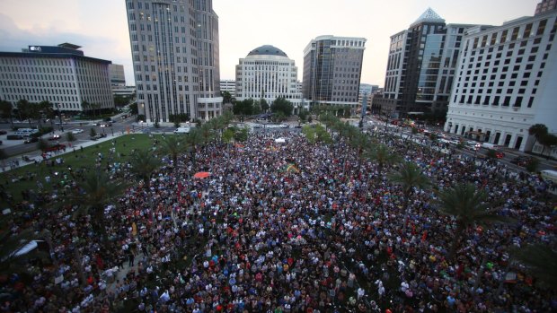 A crowd gathers for a vigil in honour of the Pulse night club shooting victims in Orlando, Florida.