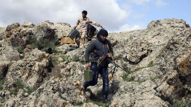 Rebel fighters from the Free Syrian Army in Deraa, in north-west Syria, on Tuesday.