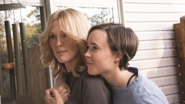 Laurel Hester (Julianne Moore) and Stacie Andree (Ellen Page) in a scene from <i>Freeheld</i>.