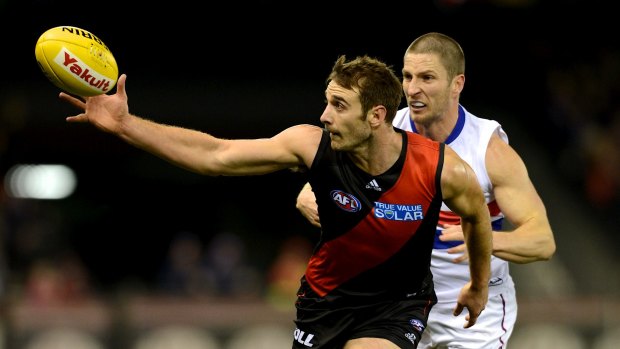 Jobe Watson in action against the Western Bulldogs during 2012.