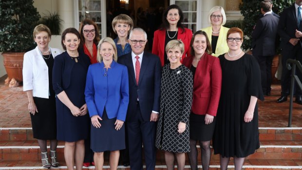 Girls to the front: Prime Minister Malcolm Turnbull with senior women members of his ministry, after the swearing-in ceremony at Government House in July last year.