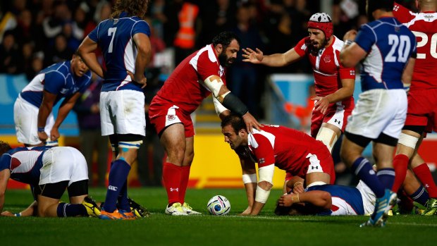 Mamuka Gorgodze of Georgia (c) after scoring the opener.