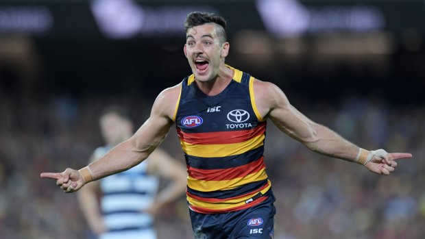 Adelaide captain Taylor Walker celebrates a goal against Geelong in the preliminary final at the Adelaide Oval on Friday night.