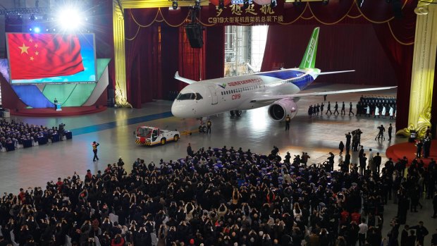 The C919 it rolls off the production line at Shanghai Aircraft Manufacturing in November 2015.