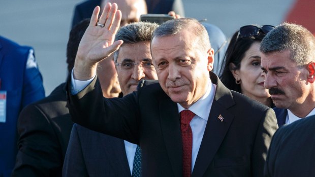 Turkish President Recep Tayyip Erdogan arrives at Hamburg Airport for the G20 economic summit.
