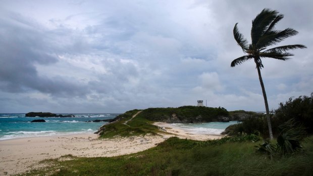 Wind and surf picks up as Hurricane Nicole approaches the Cooper's Island Nature Reserve in St Georges, Bermuda on Wednesday.
