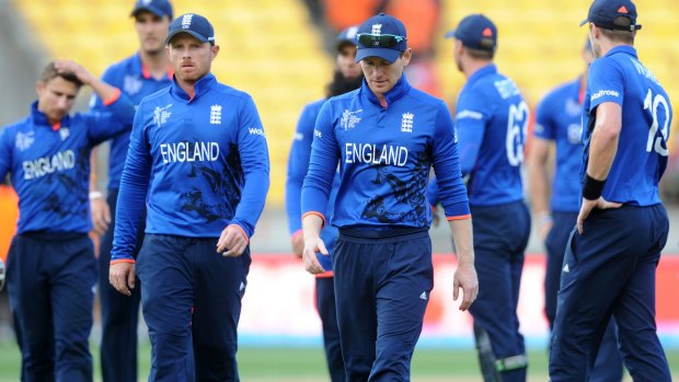 Familiar feeling: England trudge off the pitch after another World Cup defeat.