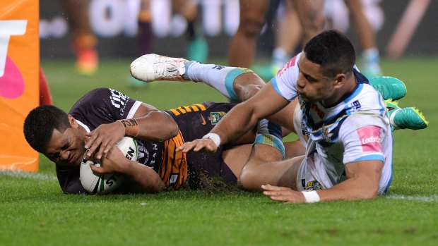 Points avalanche: Jarryd Hayne can't stop Anthony Milford scoring.