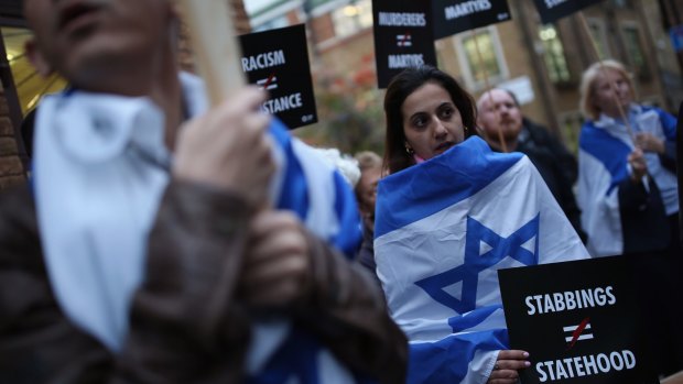 Israeli protesters gather outside the Palestinian Mission in London on Tuesday to protest at the recent stabbings.