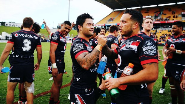 At last: Issac Luke and Jazz Tevaga celebrate their win over the Dragons.