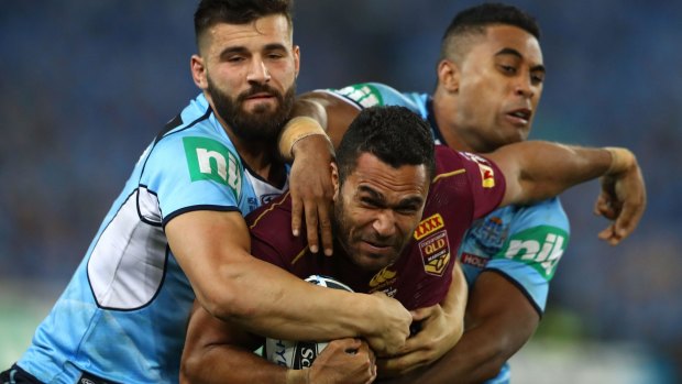 Controversial ruling: Justin O'Neill is tackled during Origin I.