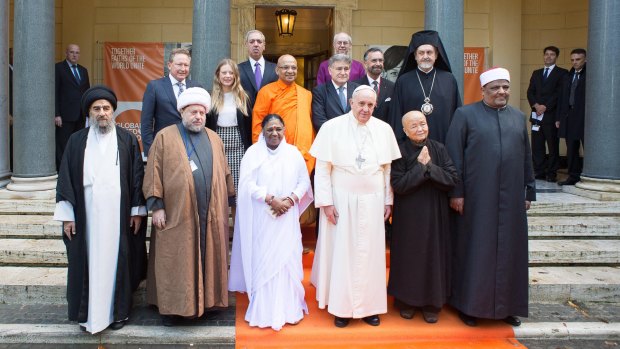 Taking a stand: Pope Francis with religious leaders at the signing of a joint Declaration of Religious Leaders against Modern Slavery. Andrew Forrest and his daughter, Grace, stand in the second row on the left.