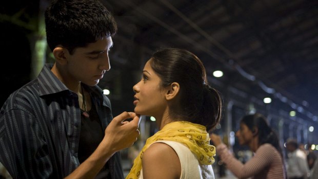 Dev Patel as Jamal Malik and Freida Pinto as Latika in Slumdog Millionaire.