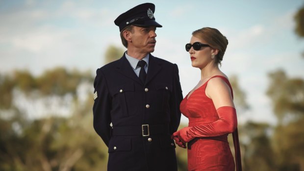 Kate Winslet and Hugo Weaving in <i>The Dressmaker</i>.