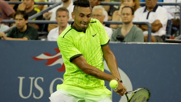 Nick Kyrgios returns to Aljaz Bedene on his way to a three-set victory over the Brit.