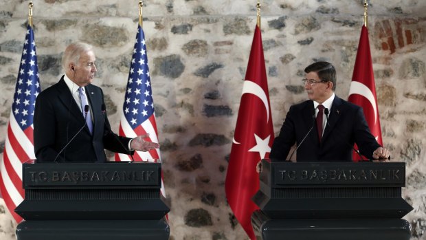 US Vice-President Joe Biden, left, ata press conference with Turkish Prime Minister Ahmet Davutoglu in Istanbul.