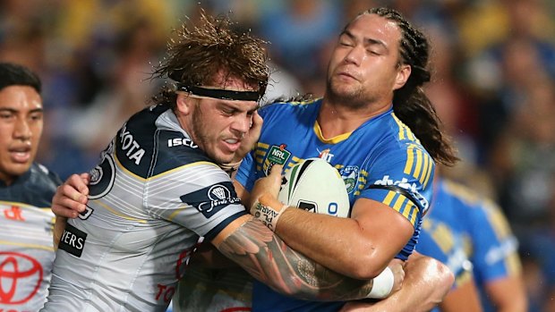 Muscling up: Tepai Moeroa hits it up for Parramatta Eels against the North Queensland Cowboys at Pirtek Stadium.