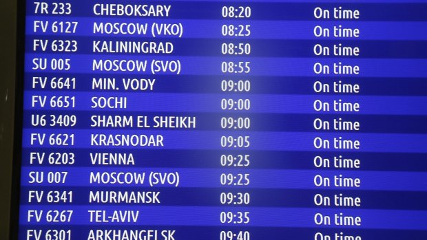A flight to Sharm El Sheikh appears on a flight information board at Pulkovo airport outside St Petersburg, Russia, on Friday, before Russia announced it was suspending all flights to Egypt. 